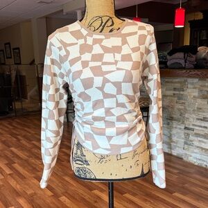 Le Lis size M cream and tan fitted sweater that cinches to preference on sides